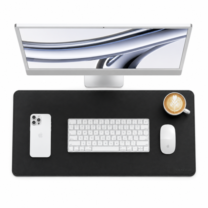 PrimeSync premium vegan leather desk mat in black, featuring a smooth matte surface, elegant rounded corners, and uniform edge stitching for a clean, minimalist remote workspace.