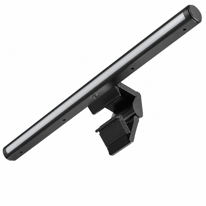 PrimeSync premium asymmetrical monitor light bar shown from a diagonal angle, featuring a matte black cylindrical aluminum body, a white anti-glare light diffuser, and a heavy-duty padded gravity counterweight clamp on a solid white background.
