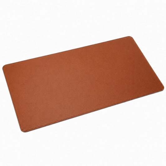 PrimeSync premium vegan leather desk mat in Brown, featuring a smooth matte surface, elegant rounded corners, and uniform edge stitching for a clean, minimalist remote workspace.