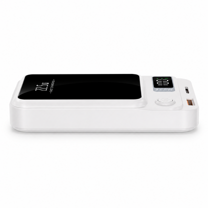 Side profile view of the white PrimeSync magnetic power bank lying flat. Highlights the side-mounted connectivity ports: a modern USB-C input/output port and a high-speed USB-A port featuring a vibrant orange internal plastic housing.