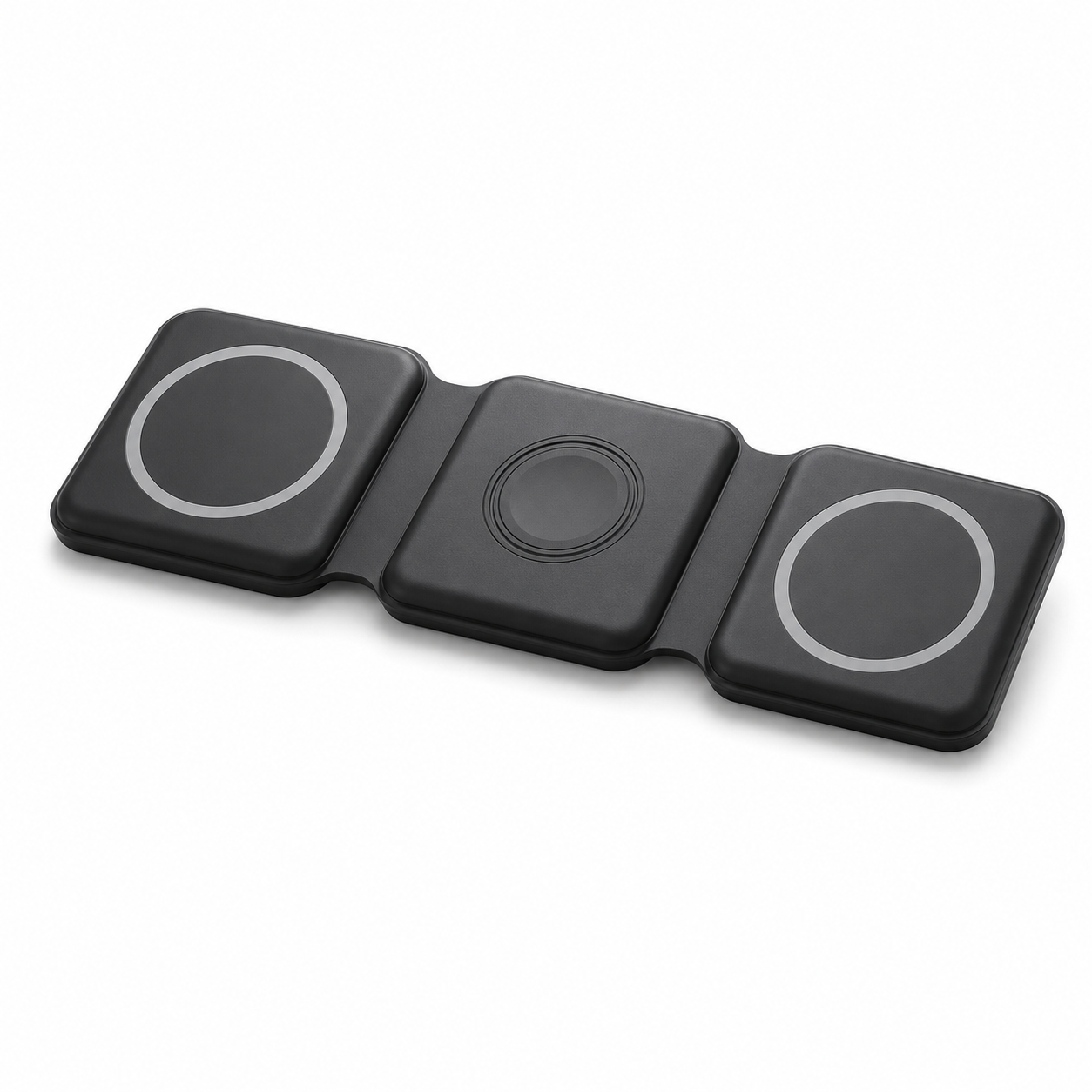 PrimeSync foldable 3-in-1 magnetic travel charger shown in matte black. High-angle isometric view highlights three flexible connected charging pads lying flat, featuring precise MagSafe alignment rings and a raised central charging puck for Apple Watch.