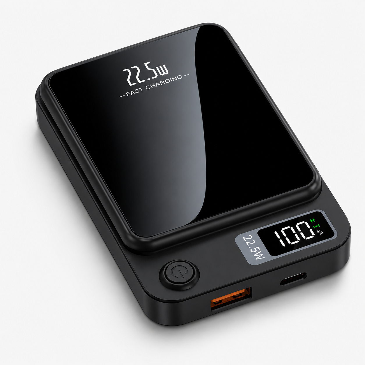 PrimeSync MagBoost 10000mAh magnetic power bank shown in a sleek matte dark grey finish. Isometric view showcases the glossy black front faceplate, the circular power button, and the bright green LED digital battery percentage display.